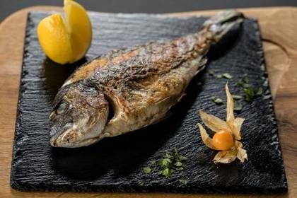 Bream Cooked on a Wooden Charcoal