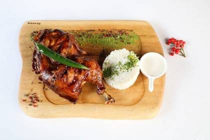 Half of a Rooster Baked on a Wooden Charcoal, with Garlic Sauce