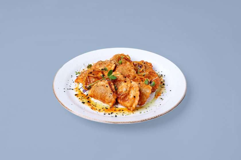Fried varenyky with potato & mushrooms