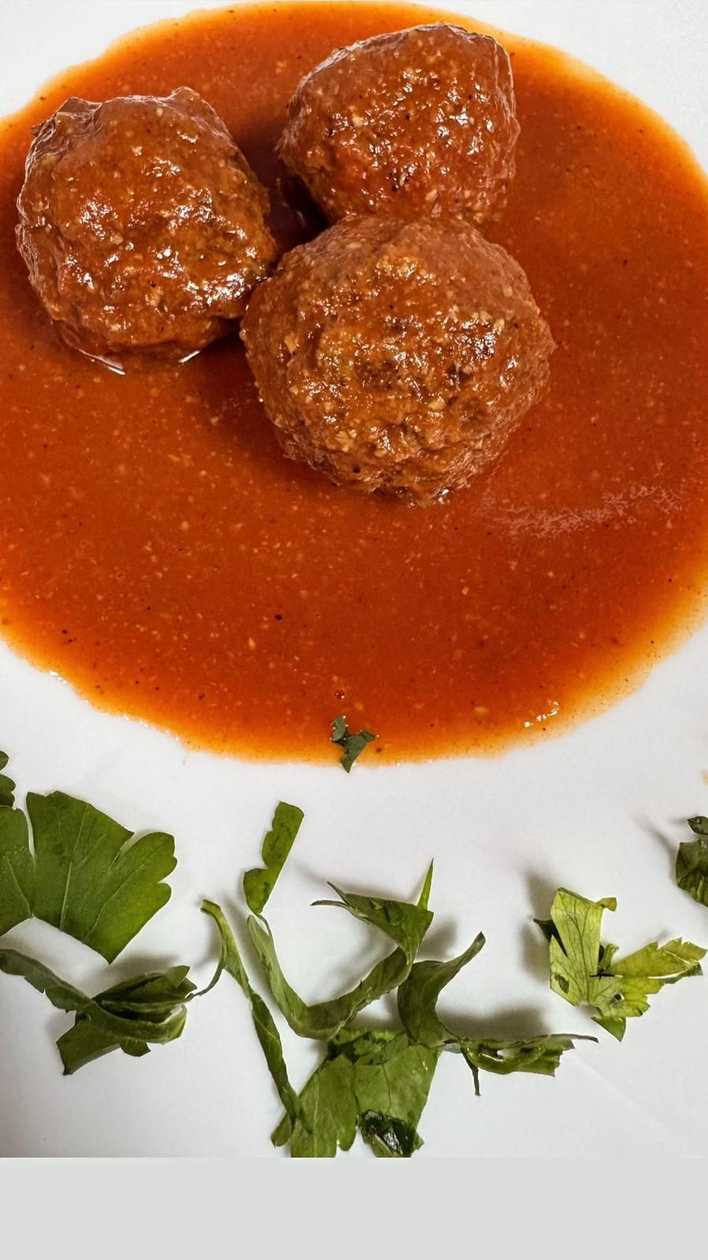 Meatballs Marinated in Red Sauce