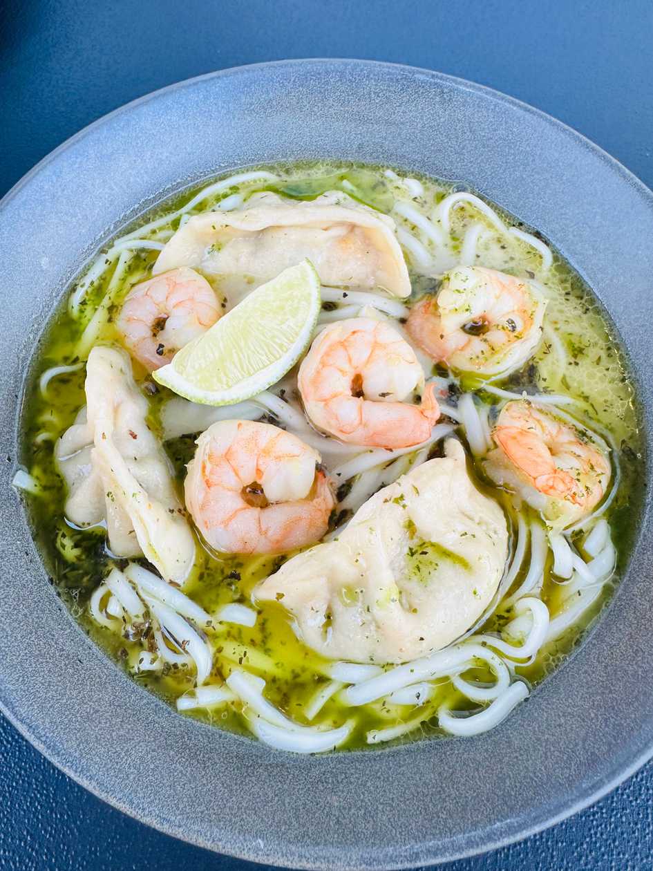 Coconut curry soup with shrimp, noodles and salmon godza