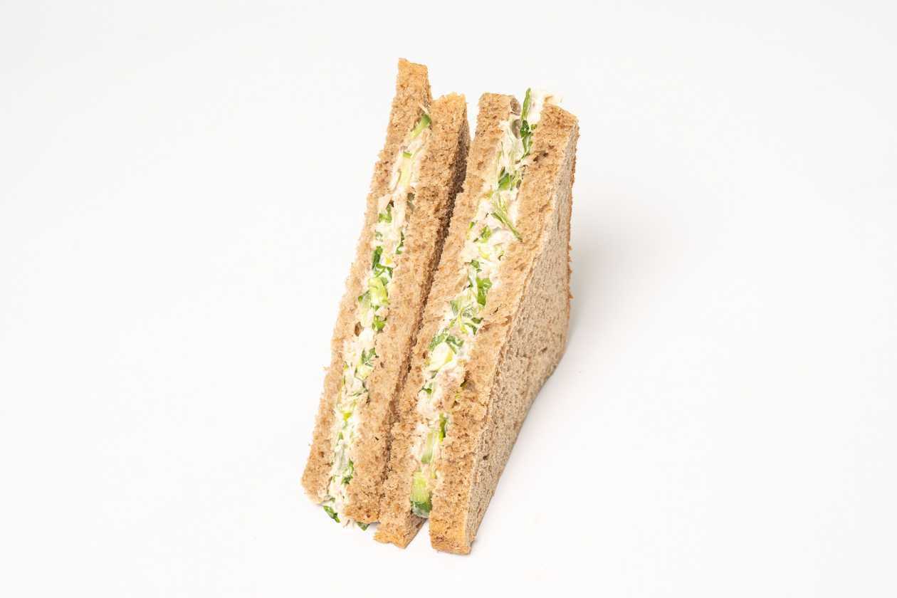 Triangular Multigrain Sandwich With Tuna Salad, Corn, Carrot