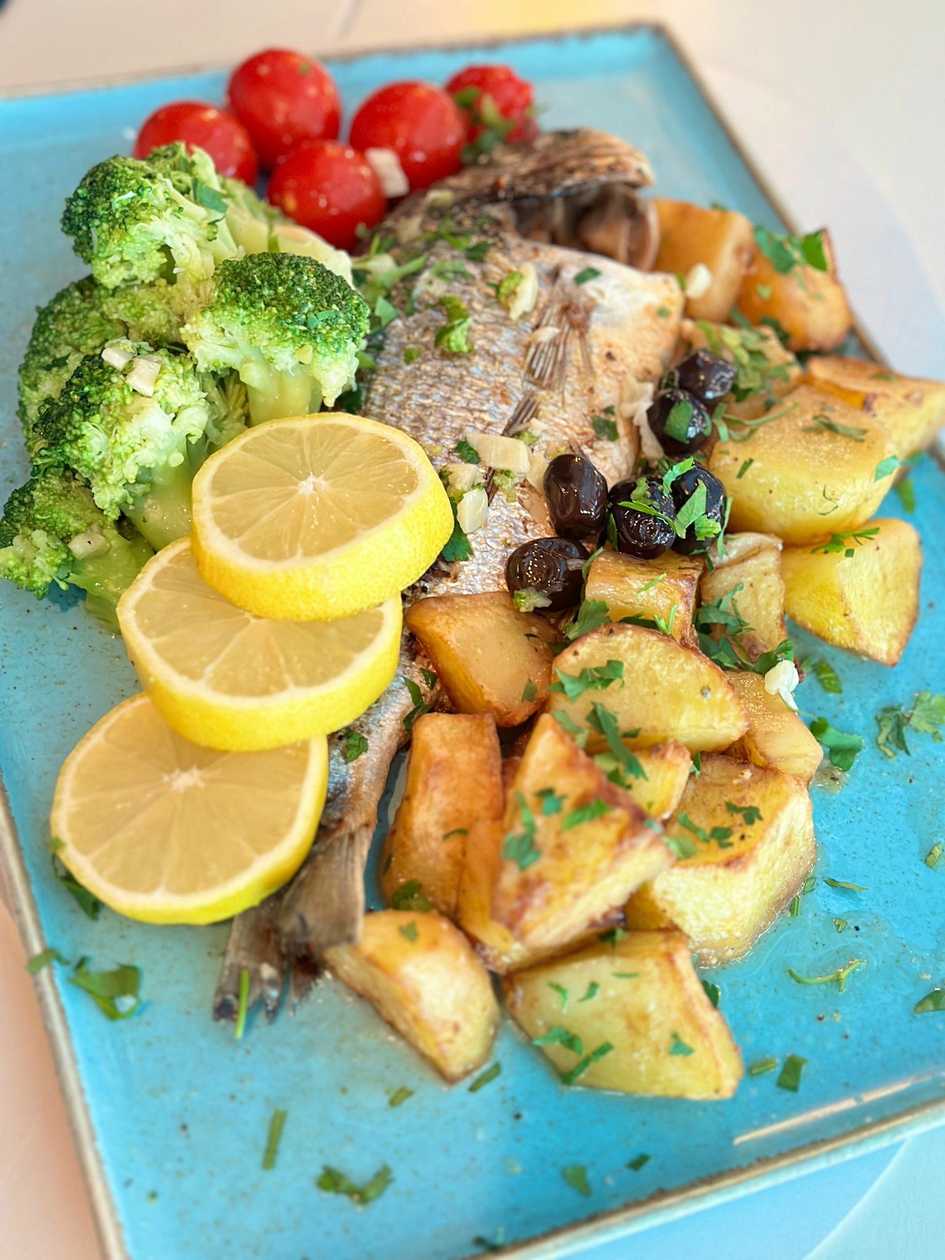Baked Sea Bream with Potatoes and Cherry Tomatoes