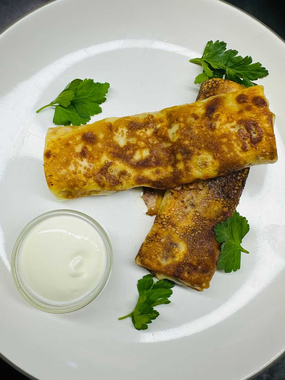 Crepes with Chicken, Mushrooms, and Suluguni Cheese