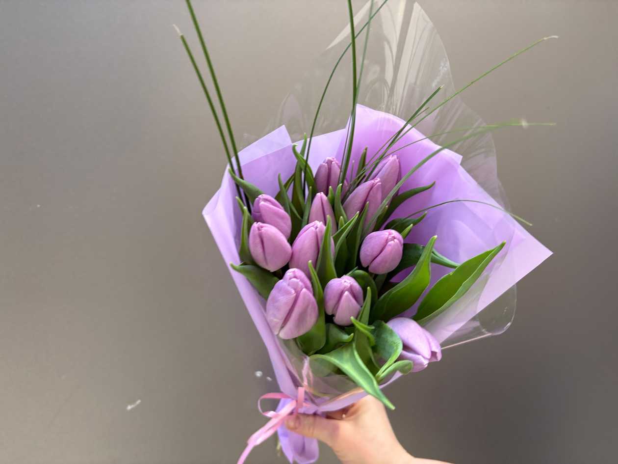 11 Light purple tulips with decorative greenery