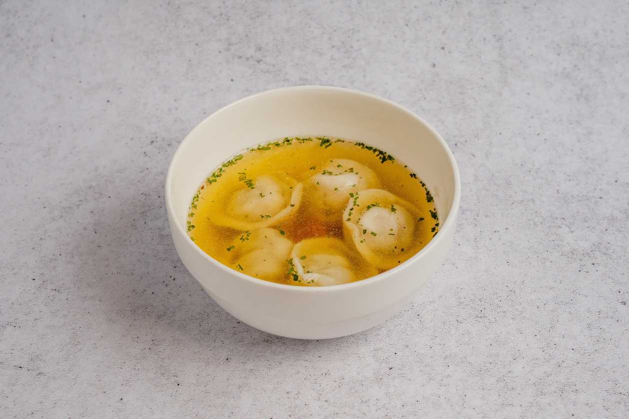 Chicken broth with pelmeni
