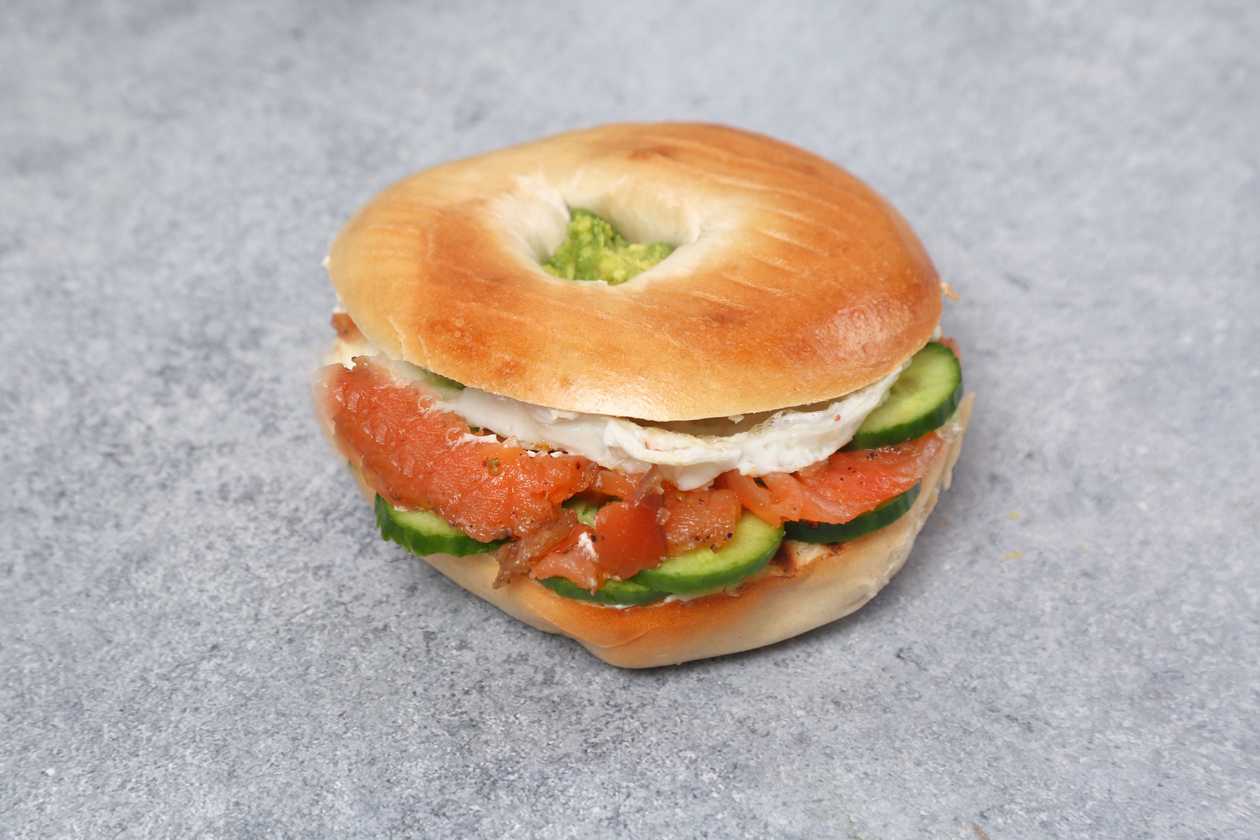 Salmon Beigel: Toasted bagel Cream cheese,cucumber, onions , egg, red pesto, avo