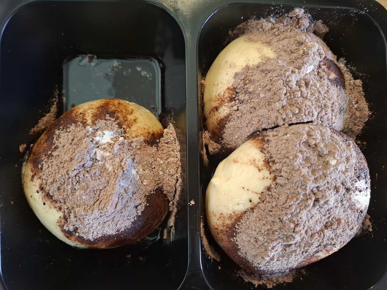 Steamed plum dumplings with cocoa and butter