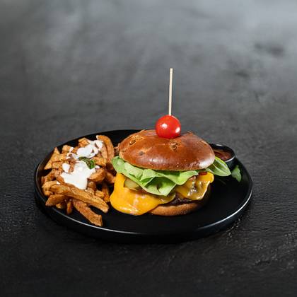 Classic burger with fries and sauce