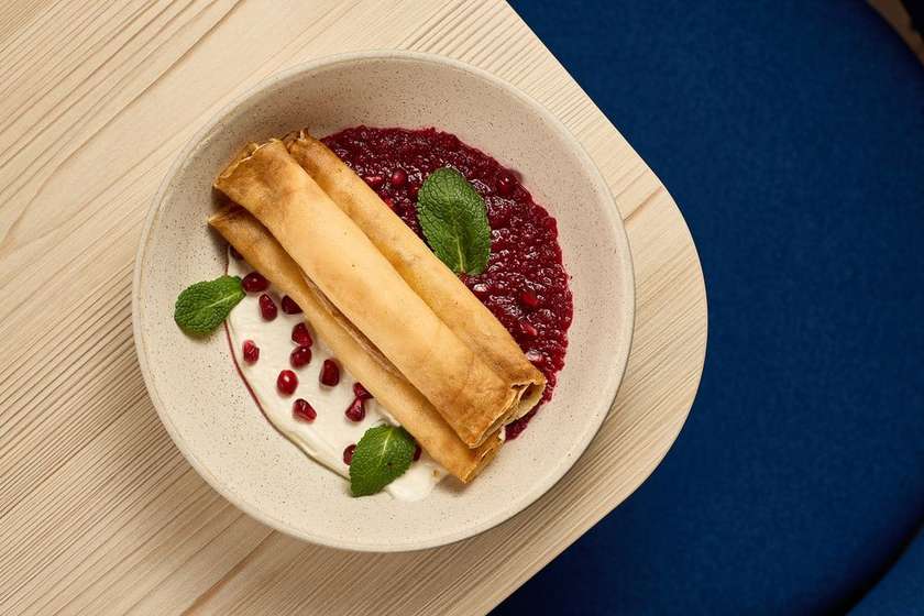 Crepes with cheese and cherry jam