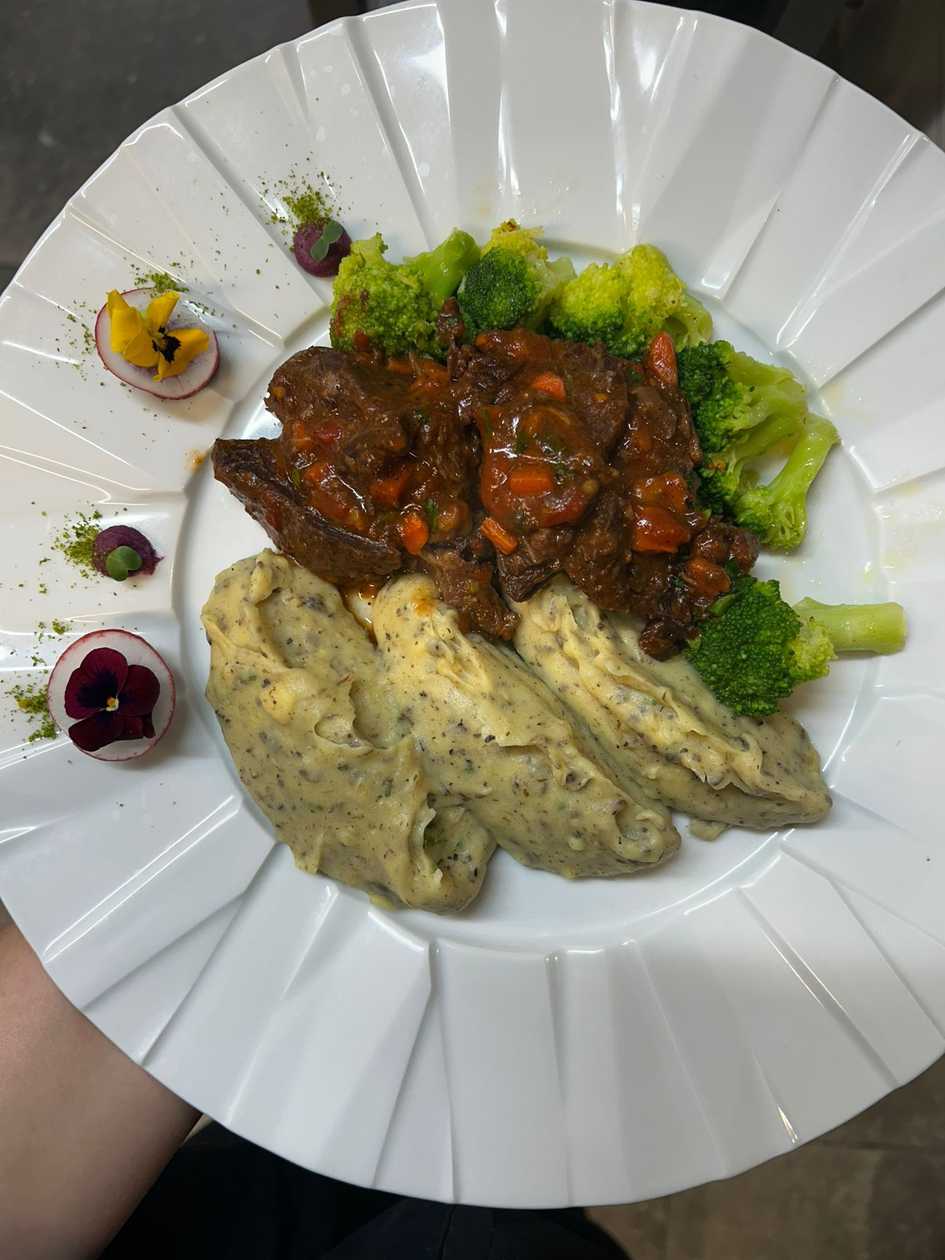 Beef cheeks, truffle puree, broccoli and peperoncino
