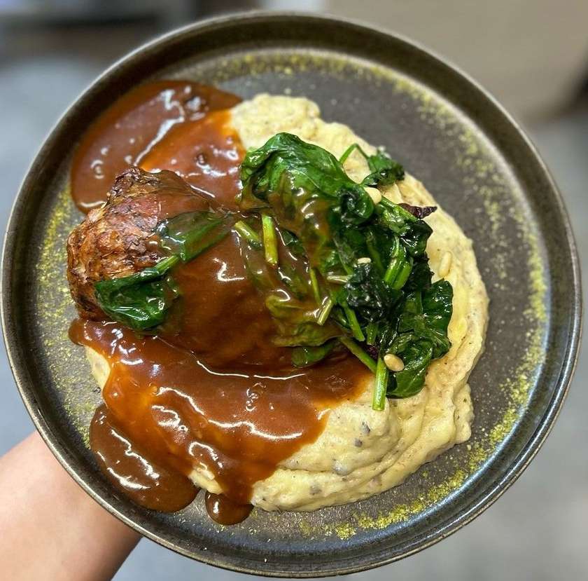Slow cooked thigh of lamb, truffle puree, baby spinach