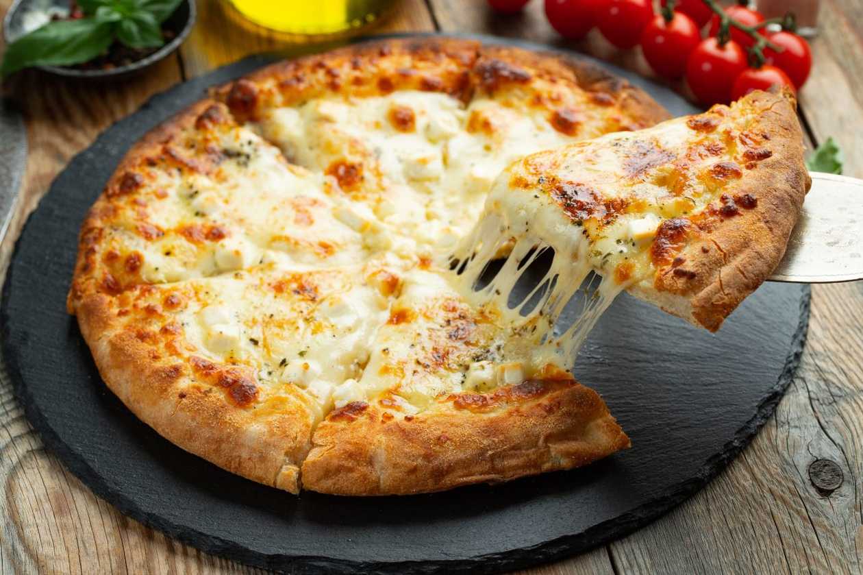 White pizza with cream and chicken