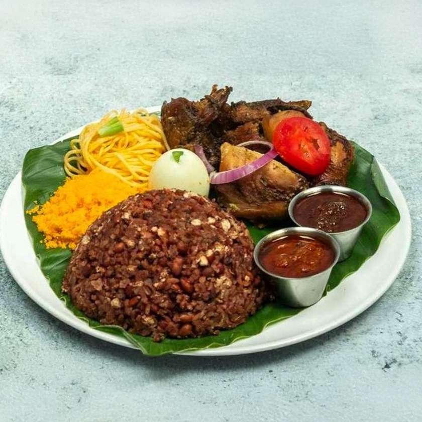 Waakye with Fish, Meat, Wele & Egg