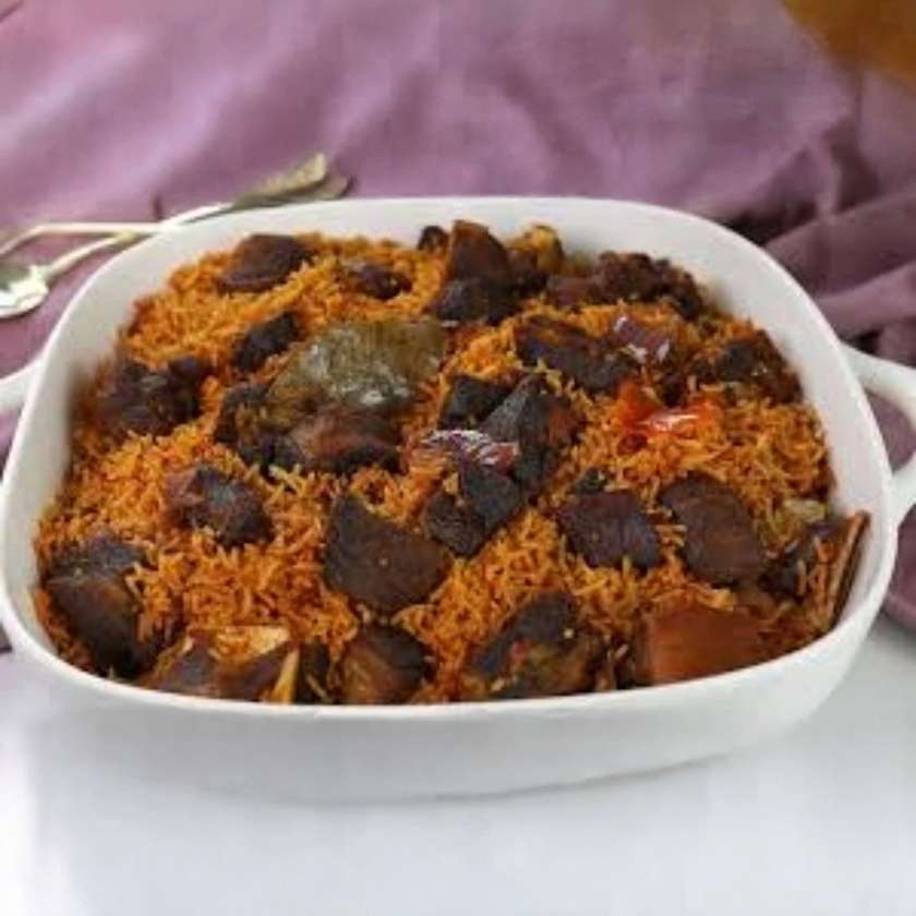 Jollof/Fried Rice and Spicy Goat