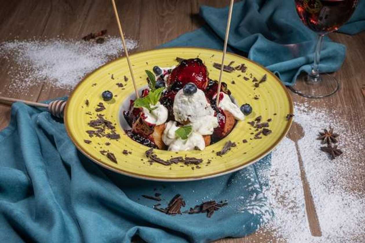 Papanasi with Blueberries and Sour Cream