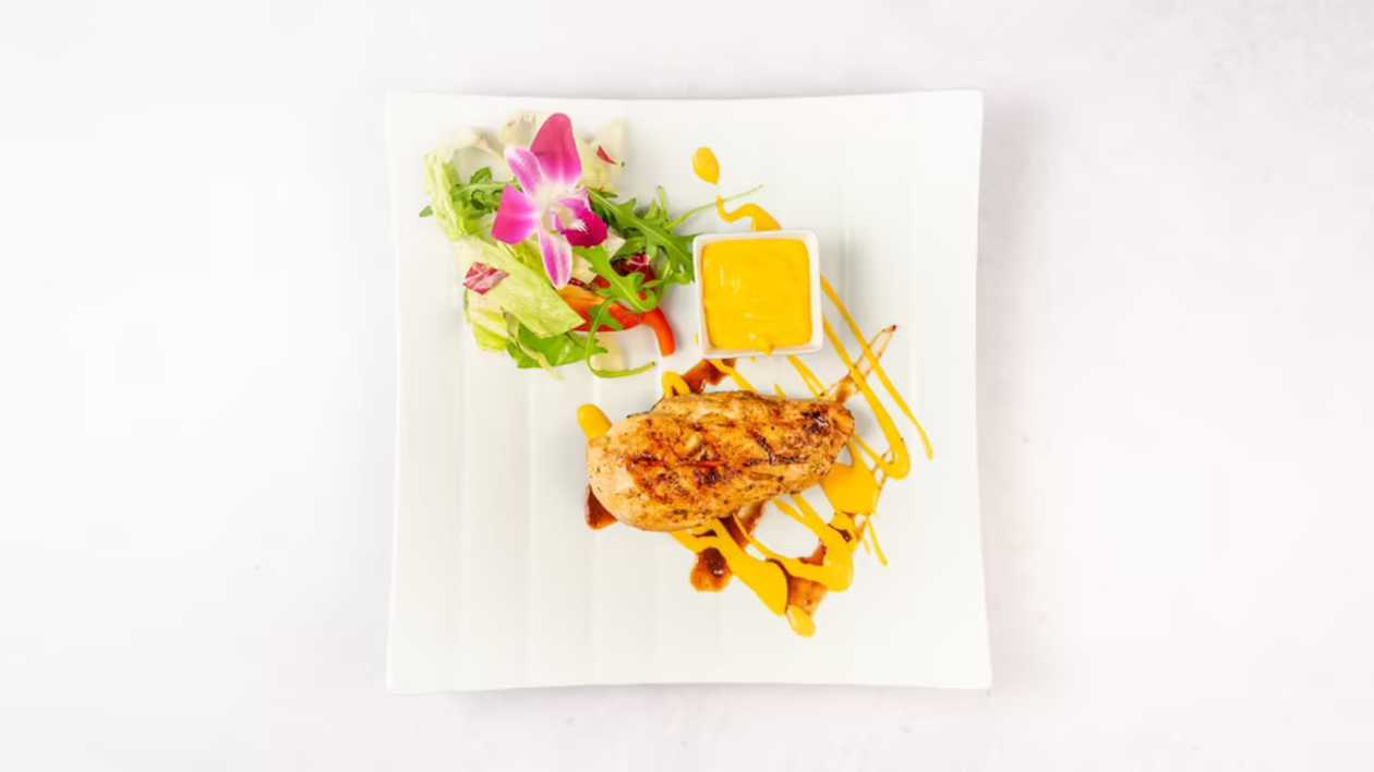 Chicken steak with cheddar sauce