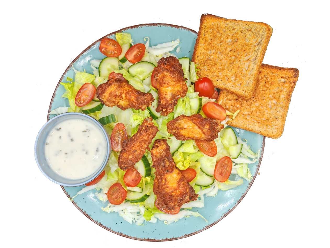 Salad with chicken wings