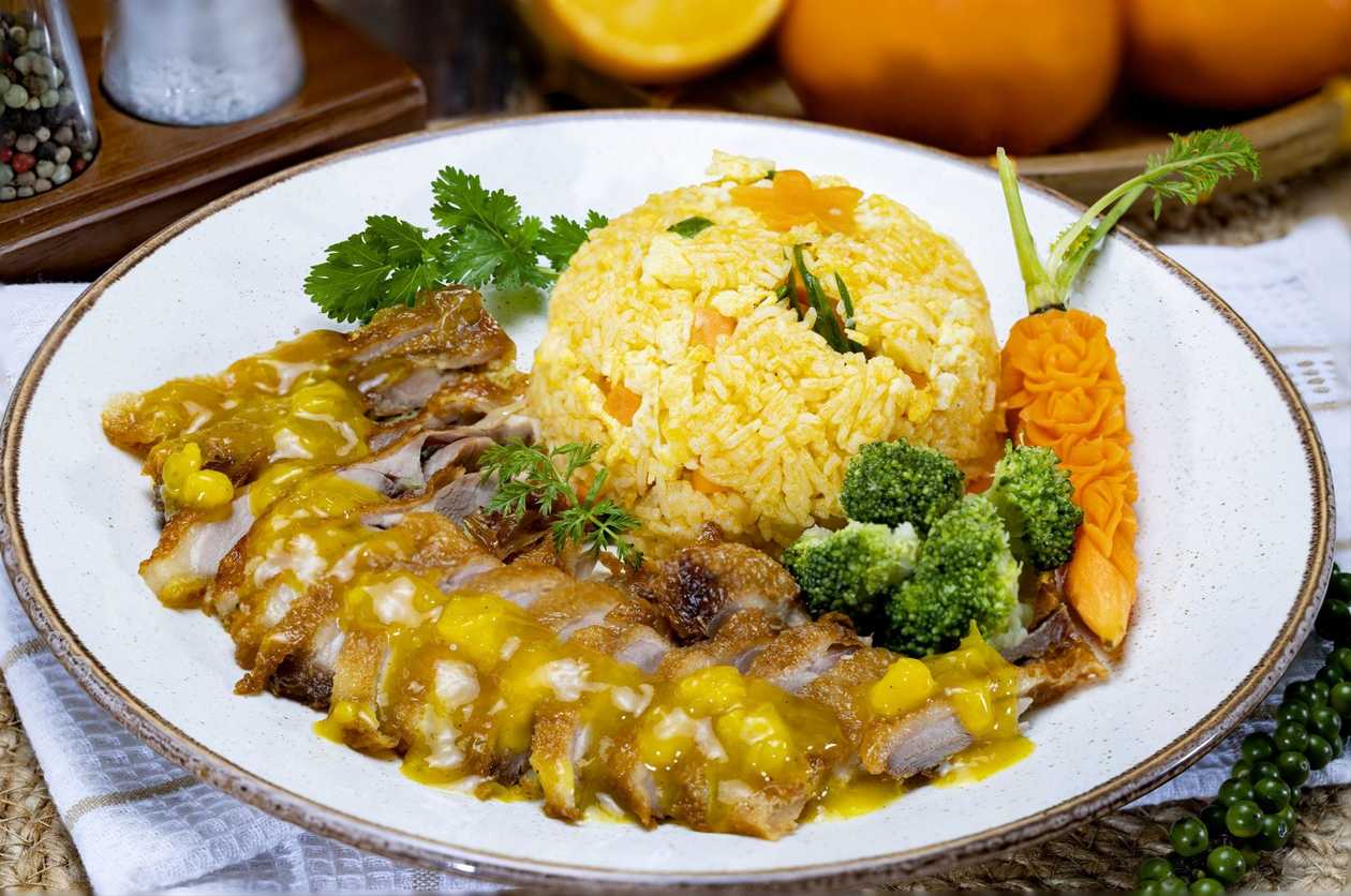 Rata in sos de portocale, orez cu legume