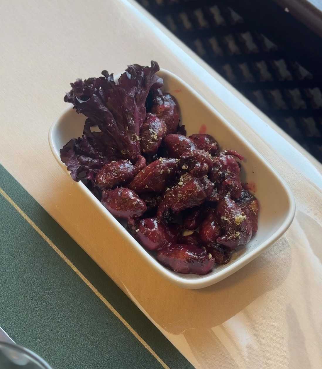 Chicken hearts in cranberry sauce