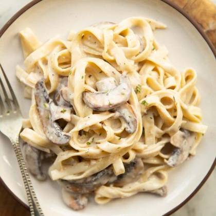 Tagliatelle al polo con funghi