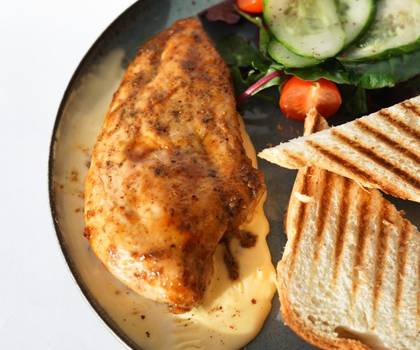 Chicken steak in cheese sauce