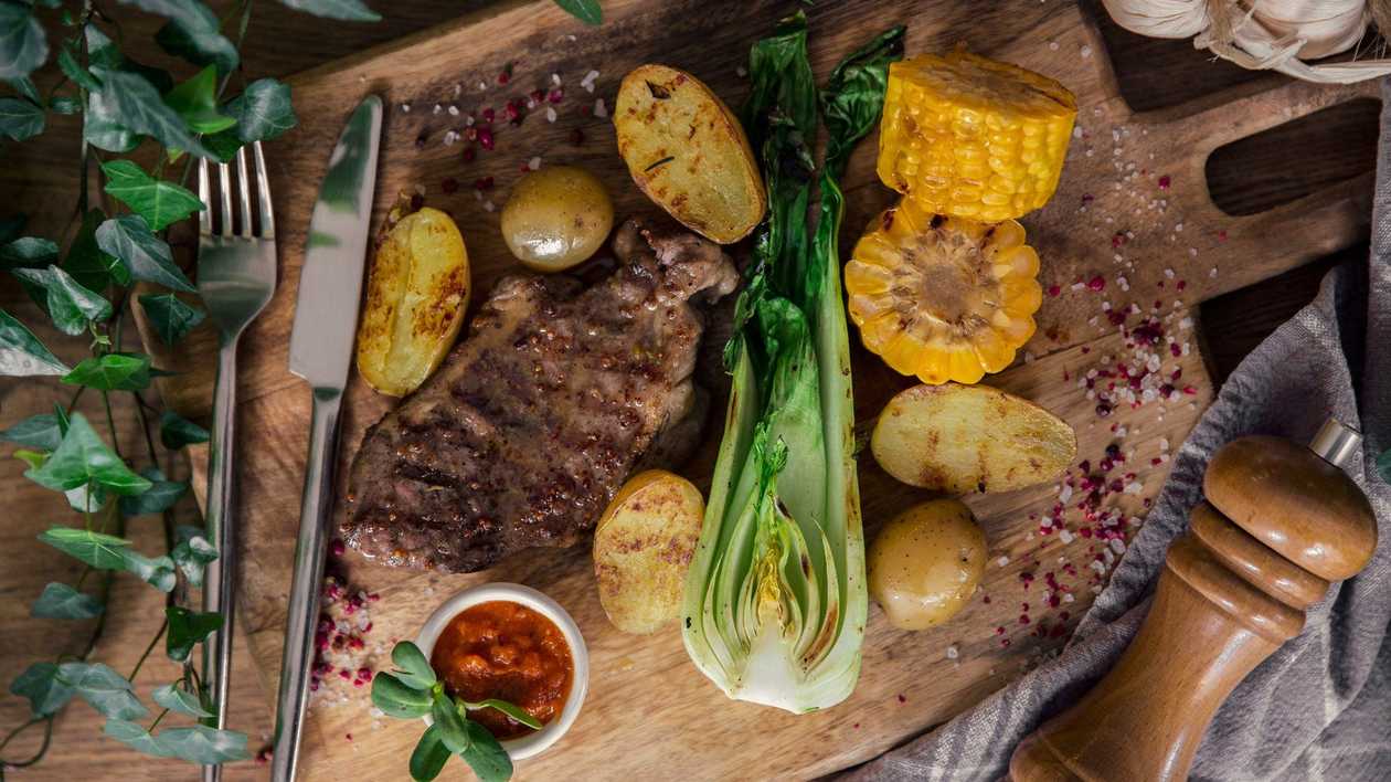 Pork neck chop with roasted vegetables