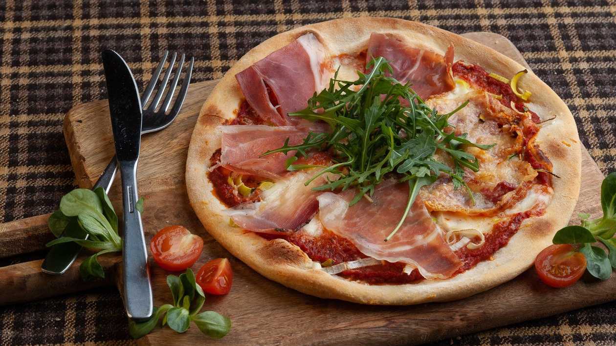 Pizza with Italian hams and bacon