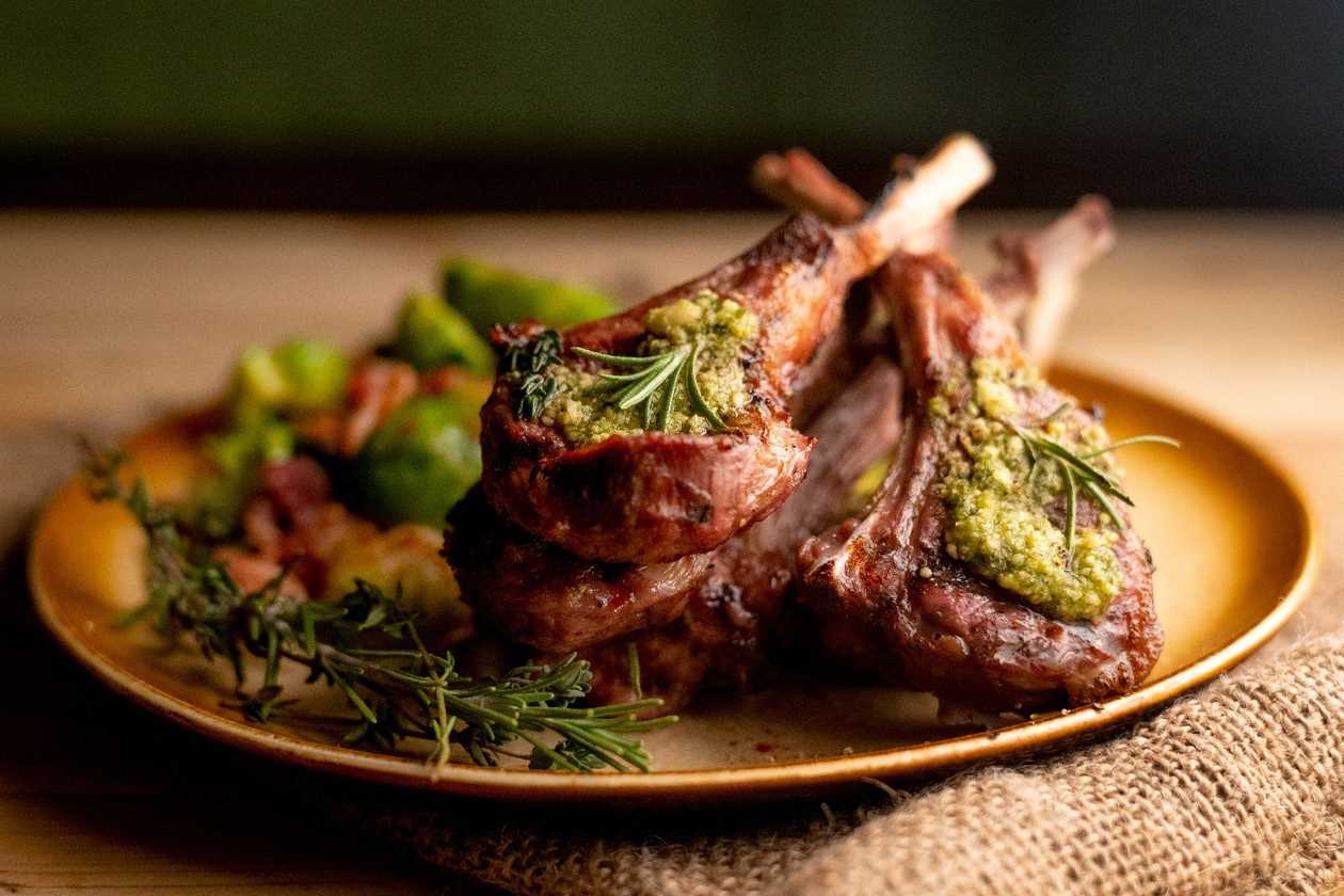 Lamb under the baking dish with potatoes