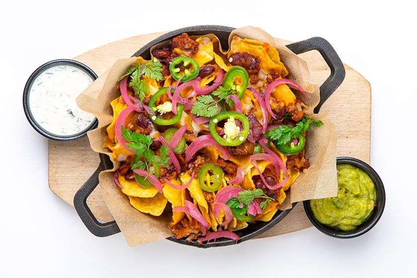 Nachos with beef, cheese and pickled onions