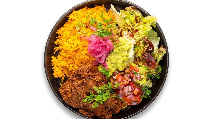 Burrito bowl with Pico de gallo salsa and homemade pulled beef