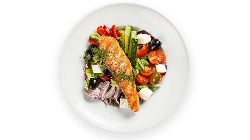 Salad with feta cheese, and fried salmon