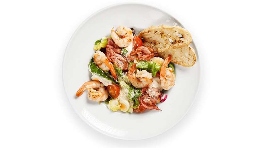 Lithuanian Ceasar salad, and fried prawns
