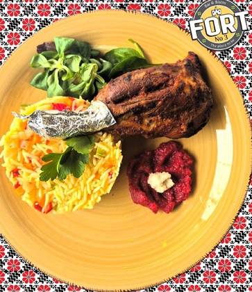 Lamb shank and rice with vegetables