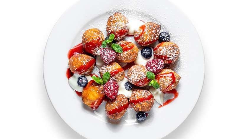 Fried cottage cheese pancakes with berries