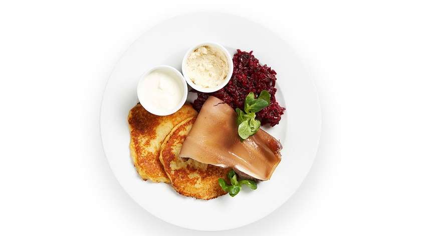 Potato pancakes with smoked pig ear