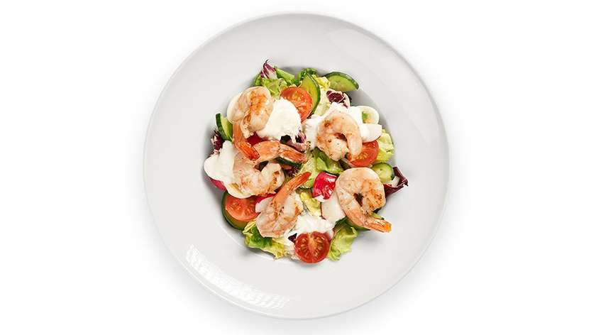 Green salad with goat cheese cream, and fried prawns