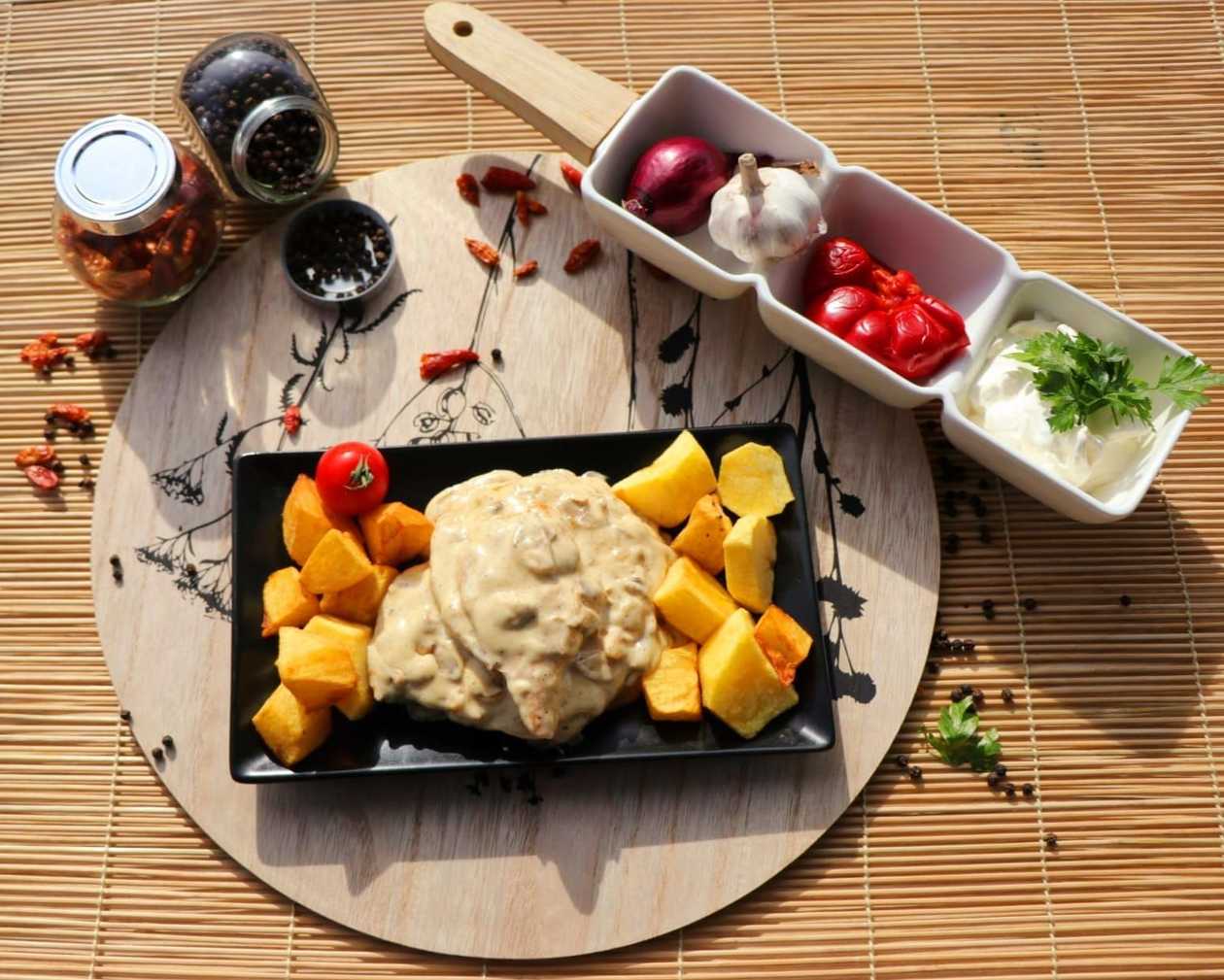 Chicken Breast with Garlic, Mushroom Sauce, and Golden Potatoes