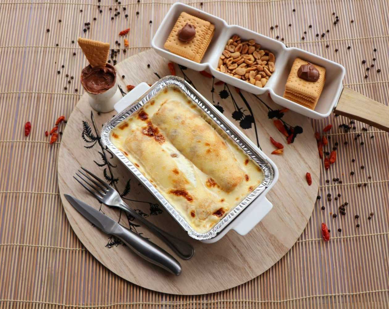 Baked Crêpes with Hazelnuts, Chocolate, and Biscuits