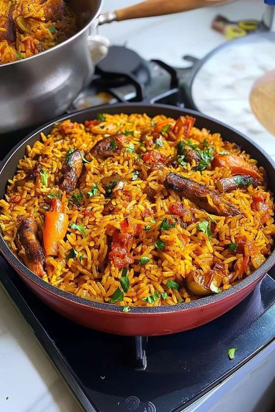 Daloo assorted jollof rice ( assorted meat mixed with vegetables and jollof rice )