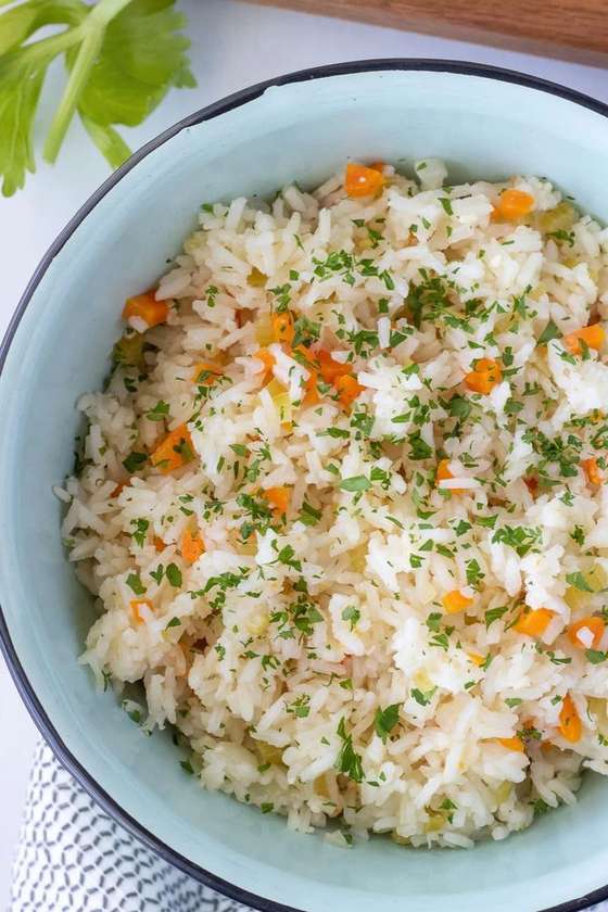 Steamed rice and gravy stew  ( steamed rice mixed with vegetables and rice )