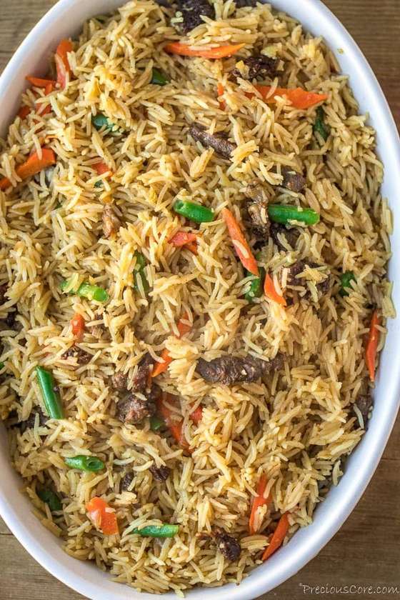 Beef Fried Rice ( stirred fried rice with vegetables and diced beef )