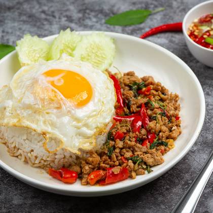 Rice topped stir-fried basil with fried egg (ข้าวกะเพราไข่ดาว)