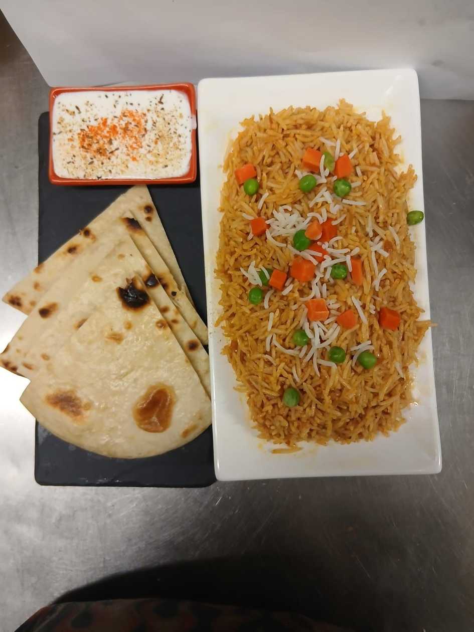 Egg briyany + pineapple raita +mushroom cheese naan