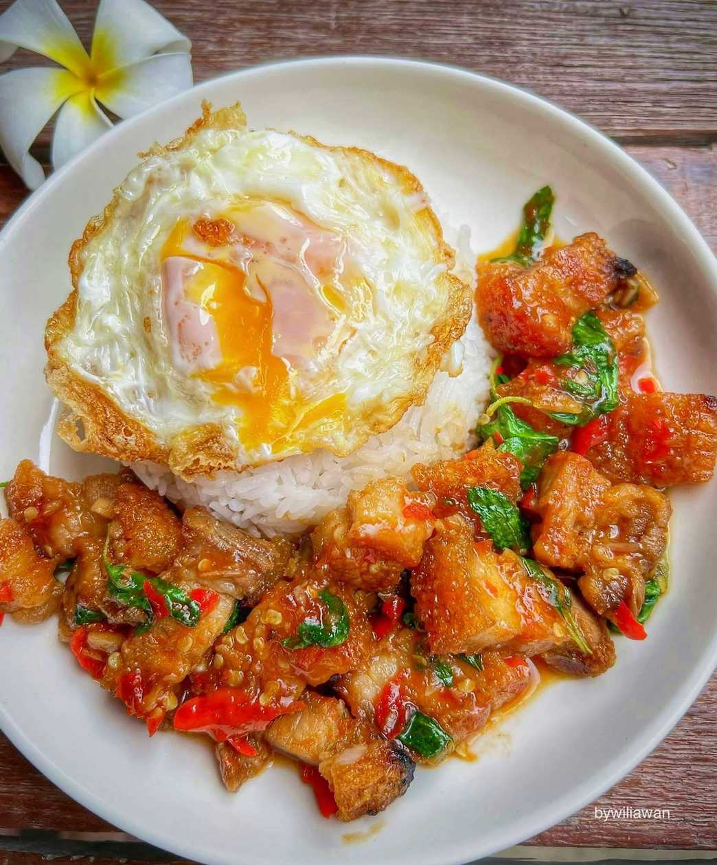 Thai basil crispy pork stir fry with rice + fried egg (กะเพราหมูกรอบ+ไข่ดาว)
