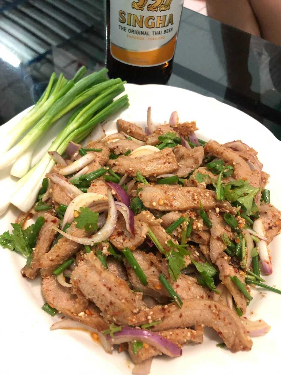 Spicy grilled pork neck (น้ำตกคอหมูย่าง)