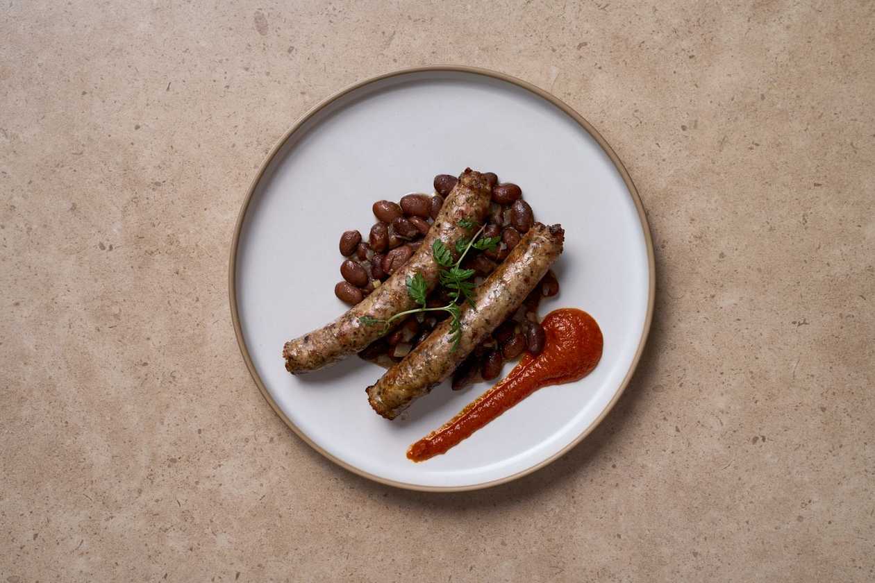 HOUSE MADE PORK, BLACK TRUFFLE AND PISTACHIO SAUSAGES