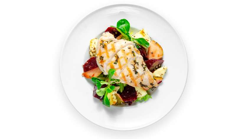 Lithuanian baked curd cheese, beet salad, and chicken