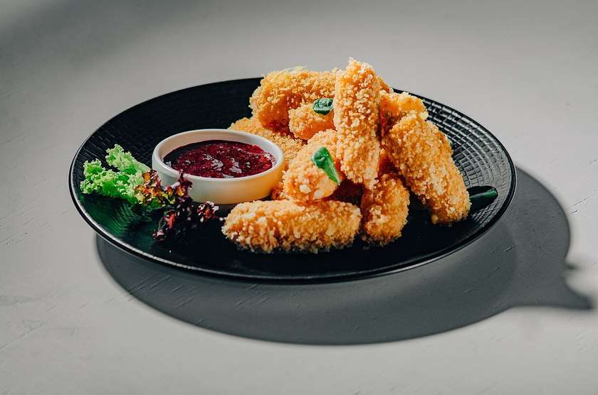 Cheese sticks with berry sauce