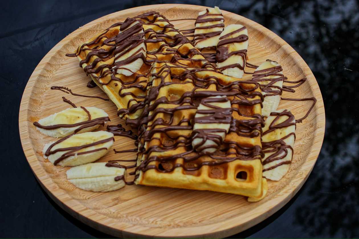 Belgian waffle with banana and chocolate